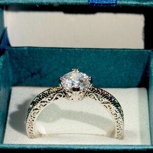 Elegant Moissanite Ring with Intricate Detailing